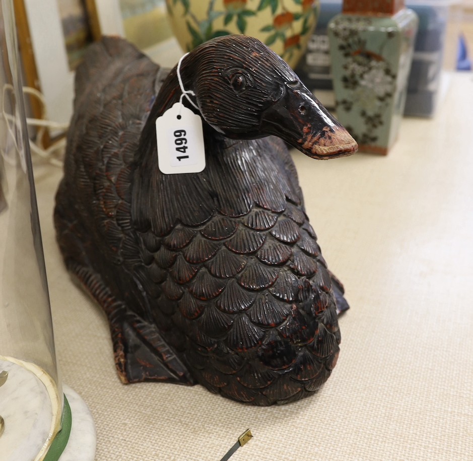 A large carved duck, 51 cms wide.